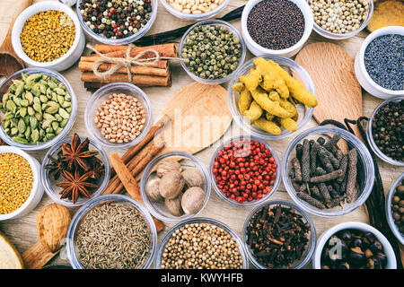 Composition of various spices on a wooden surface Stock Photo