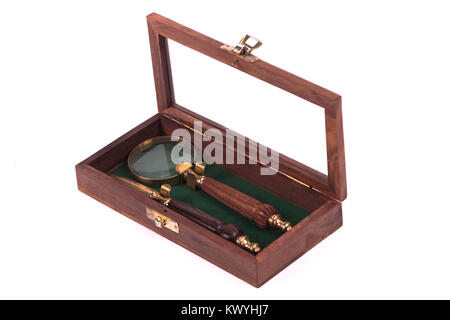 knife and loupe for letters over a white background Stock Photo