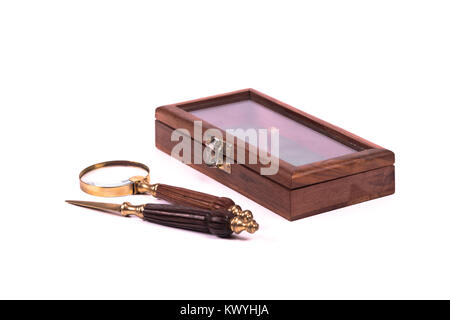 knife and loupe for letters over a white background Stock Photo