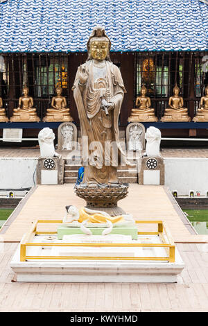 Buddha statues at the Seema Malaka buddhist temple on Beira Lake,  Colombo, Sri Lanka. Seema Malaka is a part of Gangaramaya Temple. Stock Photo