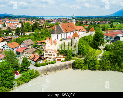 Franciscan Monastery or St. Stephan Franziskanerkloster aerial panoramic view. St. Stephan is a monastery in Fussen old town in Bavaria, Germany. Stock Photo