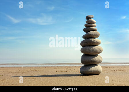Zen stone balance on the beach Stock Photo