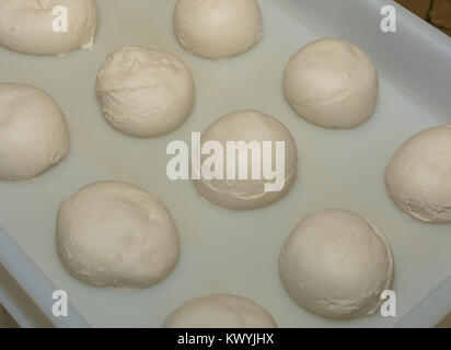 balls of fresh pasta for pizza. Food, italian cuisine and cooking concept. Preparation of the Italian Pizza Stock Photo