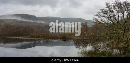 Peaceful autumn morning at Llyn Tecwyn Isaf in Snowdonia, North Wales. A beautiful small lake near Harlech. Stock Photo