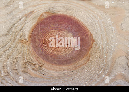 Brown wooden board with knot background texture Stock Photo