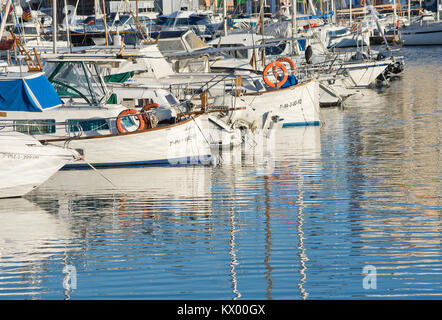 PALMA DE MALLORCA, SPAIN - JANUARY 4, 2018: Portixol marina moored boats in afternoon sunshine on January 4, 2018 in Palma de Mallorca, Spain. Stock Photo