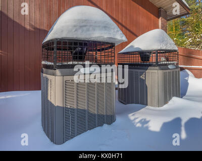 Heating units after a winter storm Stock Photo