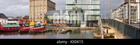 DUBLUN, IRELAND- February 1, 2017: Modern part of Dublin Docklands or Silicon Docks after heavy rain, panoramic image taken next to Grand Canal Stock Photo