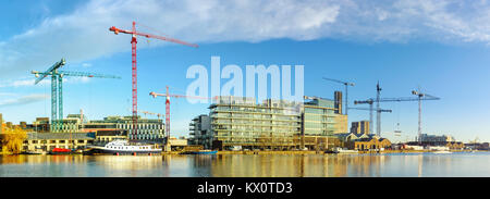 DUBLUN, IRELAND- February 4, 2017: Construction sites in modern part of Dublin Docklands, also known as Silicon Docks. Stock Photo