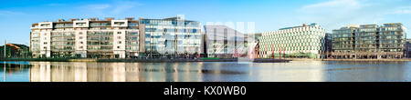 DUBLUN, IRELAND- February 4, 2017: Modern Dublin Docklands or Silicon Docks. Panorama of modern apartments, Grand Canal Square, The Bord Gais Energy T Stock Photo