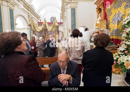 The Semana Santa, Holy week ceremony in the church of San Juan Bautista, Alquerias, Spain Stock Photo