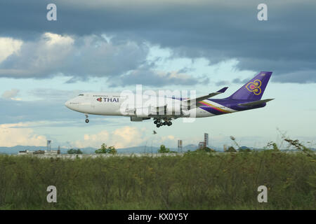 CHIANGMAI , THAILAND- JULY 24 2009: HS-TGK Boeing 747-400 of Thaiairway. Landing to Chiangmai airport from Bangkok Suvarnabhumi. thailand. Stock Photo