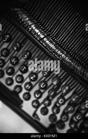Old manual typewriter machine keyboard, top view photo with soft selective focus Stock Photo