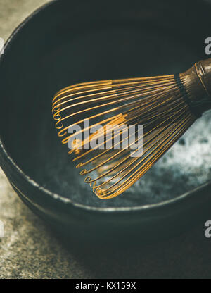 Close-up of traditional Japanese Chasen whisk and dark bowl Stock Photo