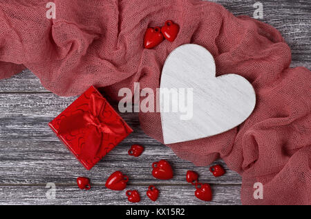 Valentines day still life wooden heart gift box on gray plank Stock Photo