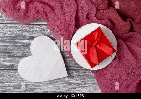 Valentines day still life wooden heart gift box on gray plank Stock Photo