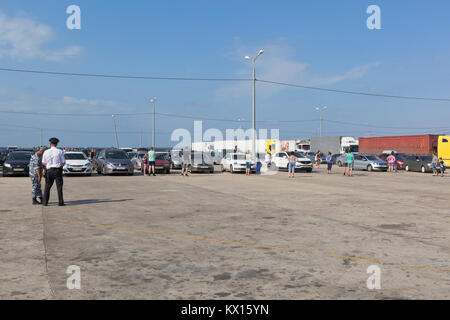 Kosa Chushka, Temryuk district, Krasnodar region, Russia - July 18, 2017: Parking of cars waiting for loading on ferries of the Kerch crossing from th Stock Photo