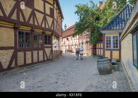 The Old Town in Aarhus is popular among tourists as it displays traditional Danish architecture from 16th century to 19th century. Stock Photo