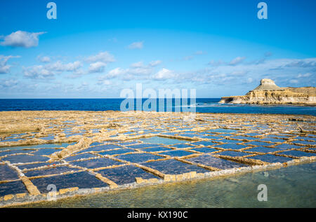 Salt evaporation ponds on Gozo island, Malta Stock Photo