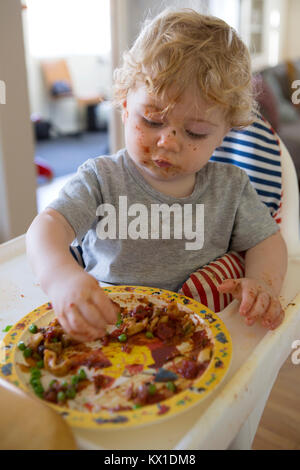 Baby-led weaning can be messy. Stock Photo