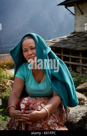 Gurung woman, Chomrong, Annapurna massif, Nepal Stock Photo