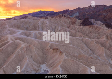 Sunrise over the unique rock formations near the Zabriskie Point in Death Valley National Park, California, United States. Stock Photo