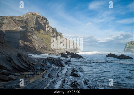 Scenic view of an ancient  chapel San Juan de Gazteluatxe located on a peninsula hill in Basque country Spain Stock Photo