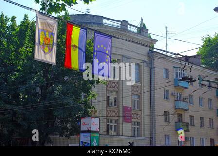 At the Bulevard Stefan cel Mare in Chișinău (Republic of Moldova): Flags of the capital, Moldova and EU Stock Photo