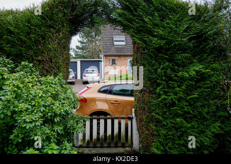 Car parked in a Chalandon building plot street, Abbeville, Normandy, France Stock Photo