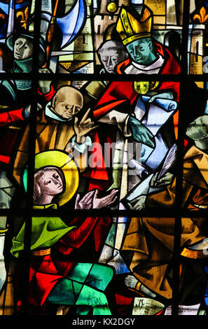 Stained glass in the cathedral of Rouen, France, depicting the Trial of Joan of Arc Stock Photo