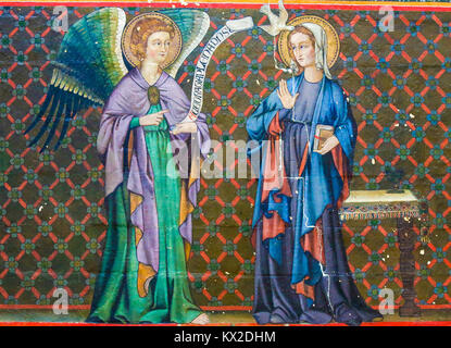Mural fresco in the Cathedral of Bayeux, France, depicting the Annunciation with Mother Mary and the Archangel Gabriel Stock Photo