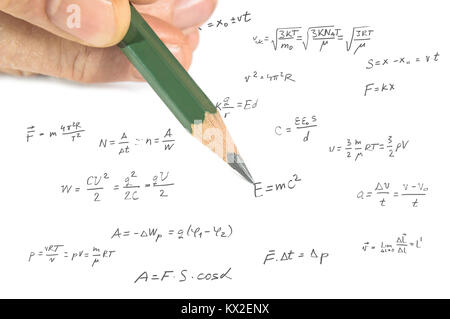 Close up of hand showing physics formula on paper Stock Photo