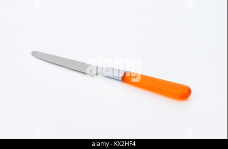 Clean table knife with orange handle Stock Photo