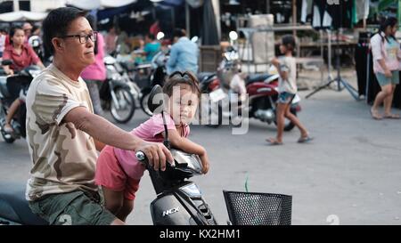 Little Girl and her Daddy Takeo Cambodia Market Area Third World Shopping Out of the Way Places Stock Photo