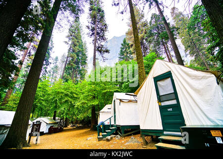 Tent And Half Dome In Yosemite With Lens Flare Stock Photo