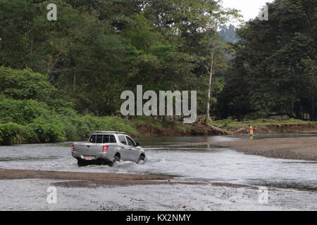 Car crossing river near Drake Bay Costa Rica Osa Peninsula Stock Photo