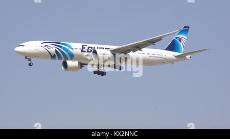DUBAI, UNITED ARAB EMIRATES - APRIL 1st, 2014: Boeing 777-300ER from Egypt Air on final approach to Dubai Airport DXB registration SU-GDR, Egypt Air is Africa's largest airline operating passenger service to about 75 destinations Stock Photo