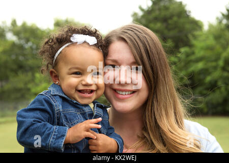 Mixed race mother and daughter. Stock Photo