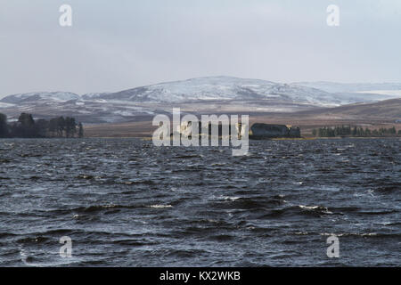 A winter landscape view of Lochindorb Castle in Scotland, UK. Stock Photo