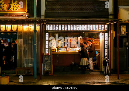 NAGOYA, JAPAN - NOVEMBER 18, 2015: NIghtlife of Japanese restaurants on the side of a street in Ngoya city Stock Photo