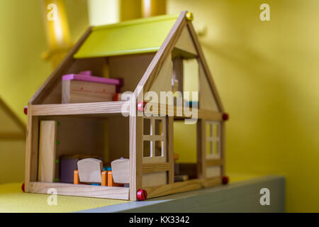 simple wooden dollhouse