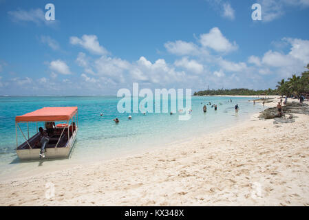 MYSTERY ISLAND, VANUATU, PACIFIC ISLANDS-DECEMBER 2,2016: Nautical vessel and tourists on the coastline of tropical Mystery Island, Vanuatu Stock Photo