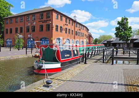 Narrowboat moored in the canal basin, Coventry, West Midlands, England, UK, Western Europe. Stock Photo