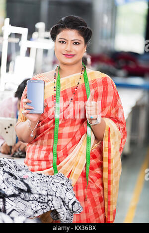 Ladies Workers Tailor s And Supervisor Showing Thumbs-up Success Sewing Workshop Stock Photo