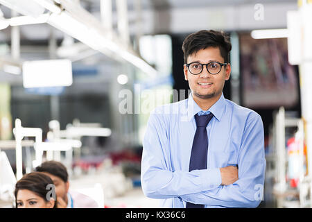 1 Female Worker Tailor Pointing Finger Showing Mobile-phone Sewing Workshop Stock Photo