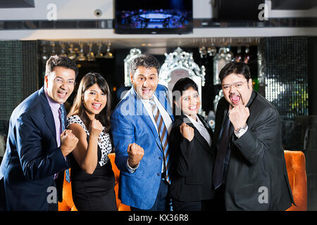 Group Business People Colleague s Hands-Fist Winning Success Celebration Restaurant Stock Photo