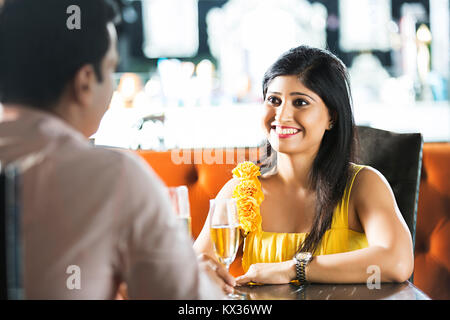 2 Couple Drinking Champagne And Talking Blind Date in Hotel Stock Photo