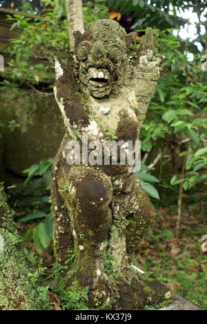 Green demon with teeth, bali, indonesia Stock Photo