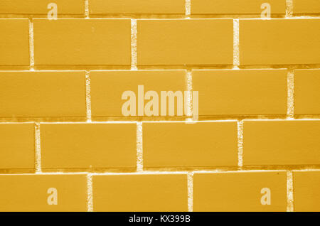 Close-up of Bricks Wall in Vibrant Yellow Color, for Background, Texture, Pattern Stock Photo