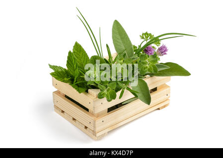 herbs in a crate isolated on white Stock Photo